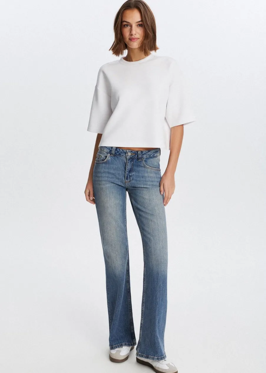 The Sting Flared jeans met printdetail<DAMES Jeans