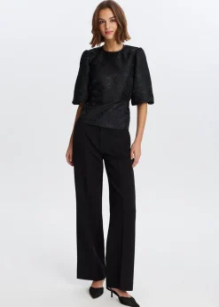 The Sting Jacquard top met strik<DAMES Tops