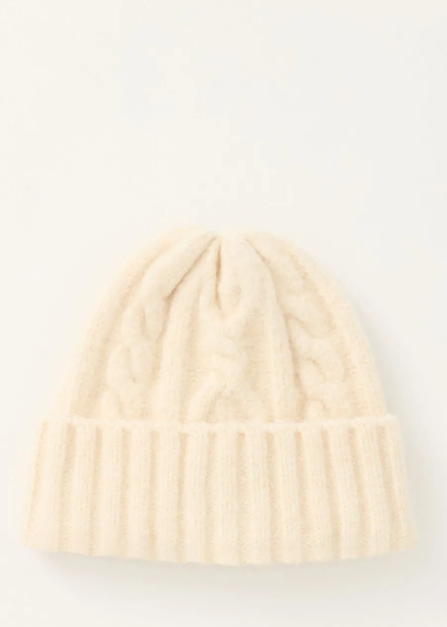 The Sting Muts met kabelpatroon<DAMES Mutsen