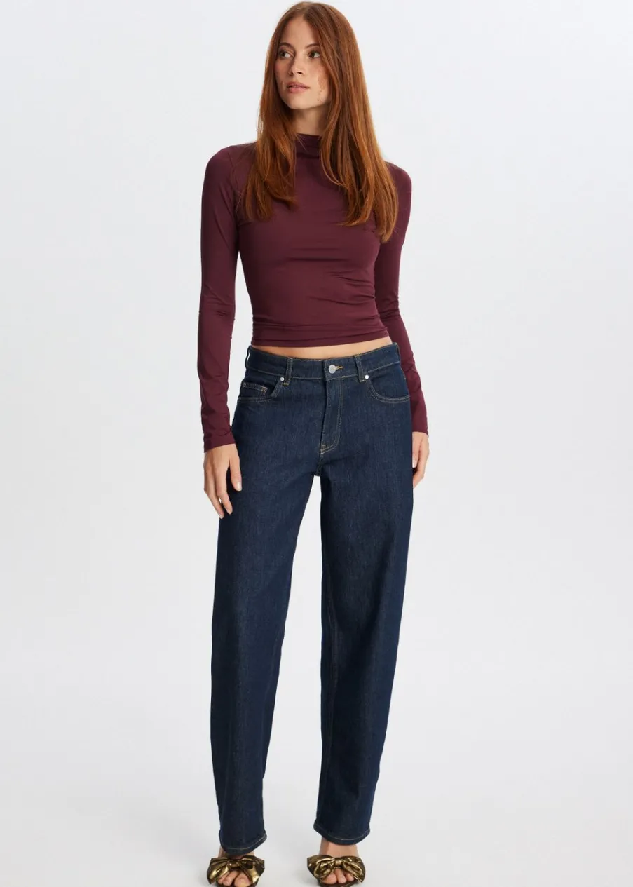 The Sting Top met hoge hals<DAMES Tops