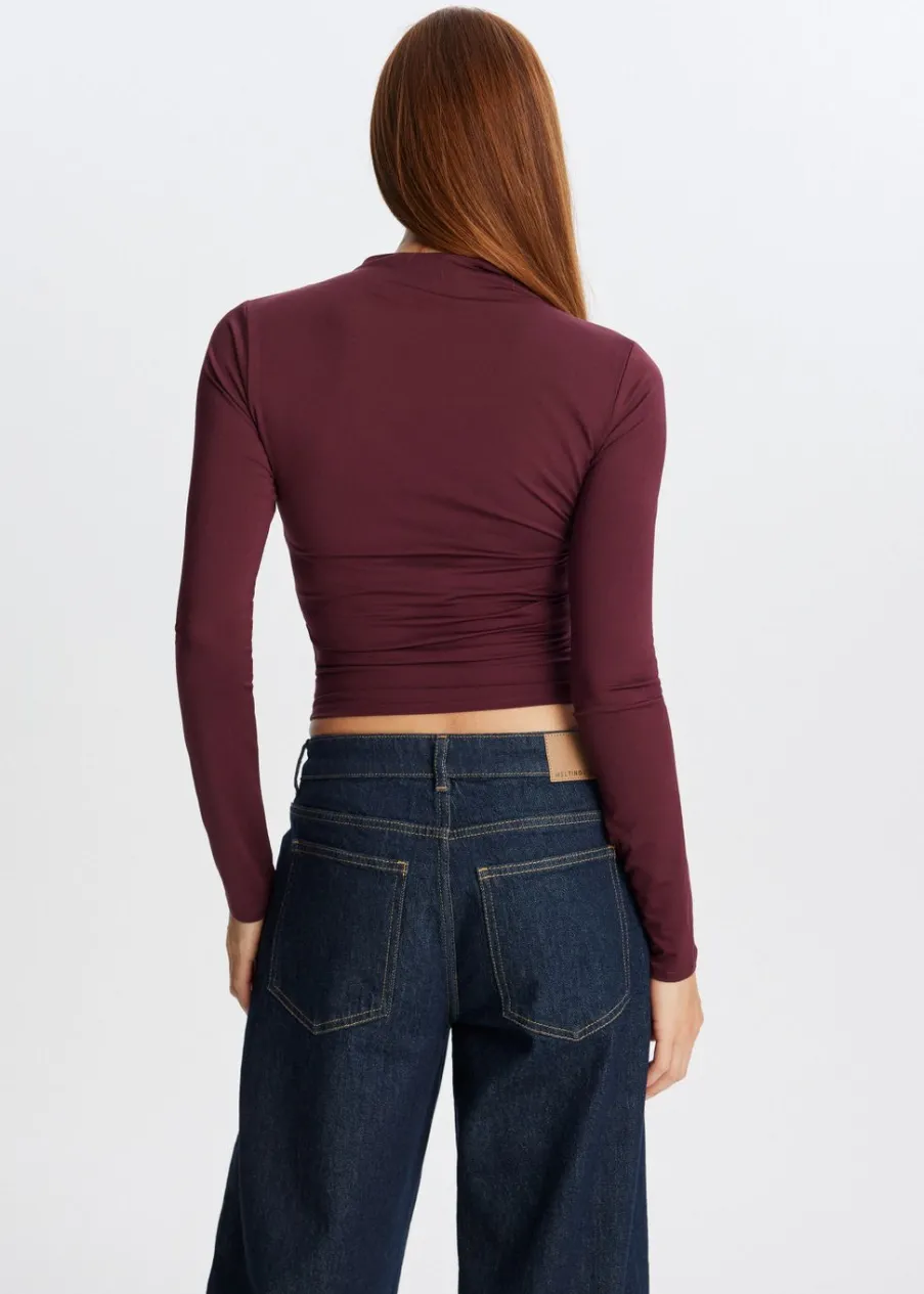 The Sting Top met hoge hals<DAMES Tops