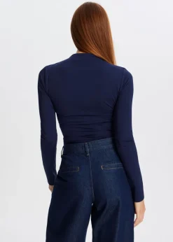 The Sting Top met hoge hals<DAMES Tops