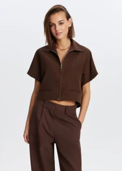 The Sting Top met rits<DAMES Tops