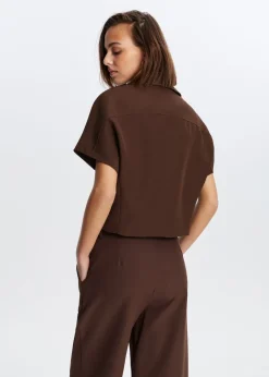 The Sting Top met rits<DAMES Tops