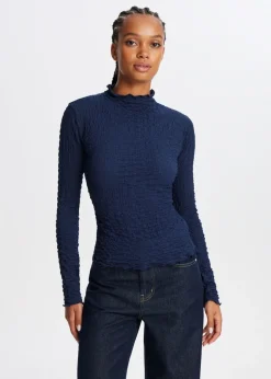 The Sting Top met strikdetail<DAMES Tops