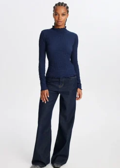 The Sting Top met strikdetail<DAMES Tops