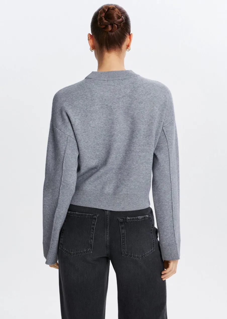 The Sting Trui met label<DAMES Truien En Vesten