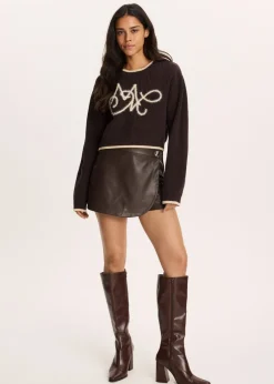 The Sting Trui met opening op de rug<DAMES Truien En Vesten