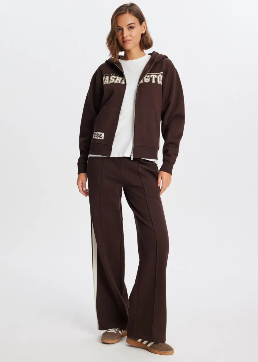 The Sting Varsity vest<DAMES Truien En Vesten