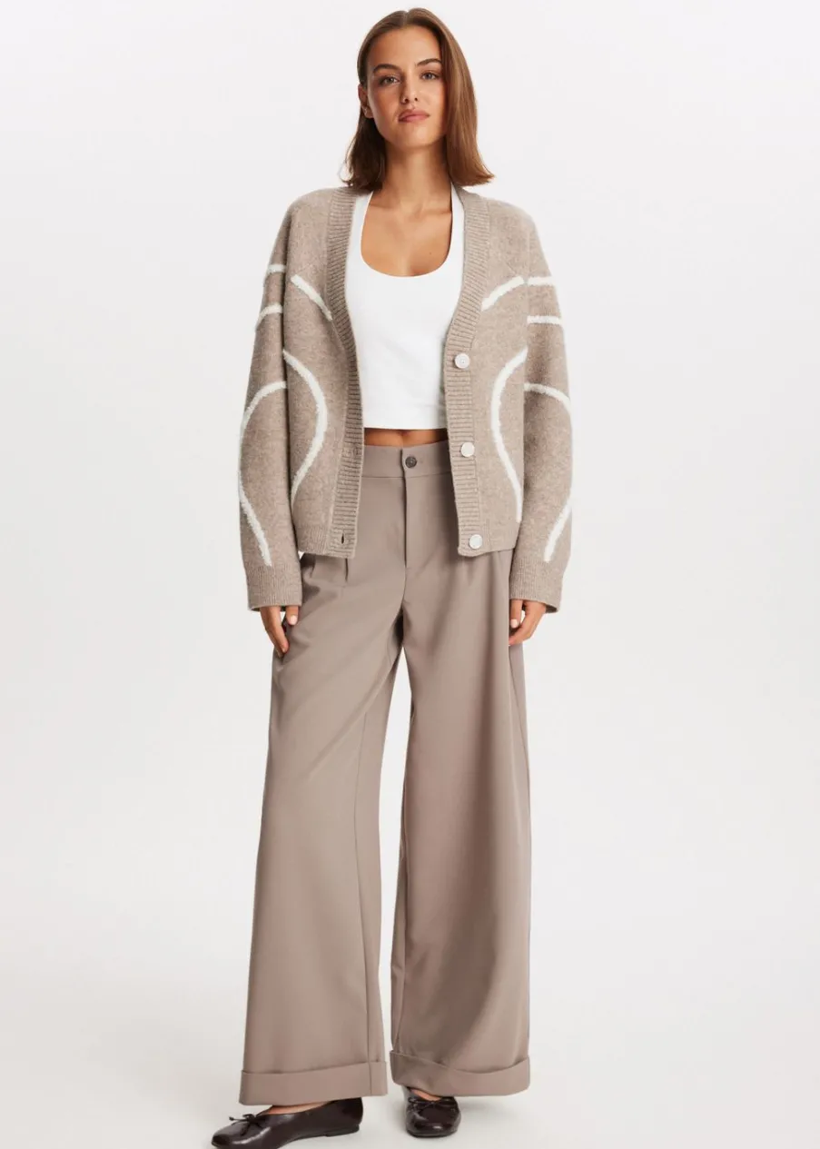 The Sting Vest met 3D patroon<DAMES Truien En Vesten